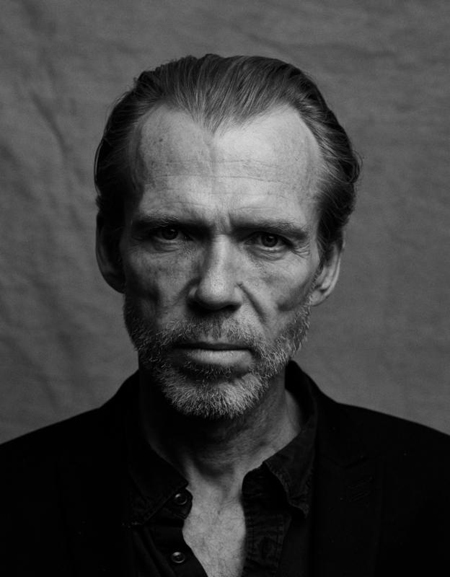A black and white picture of Richard Brake.